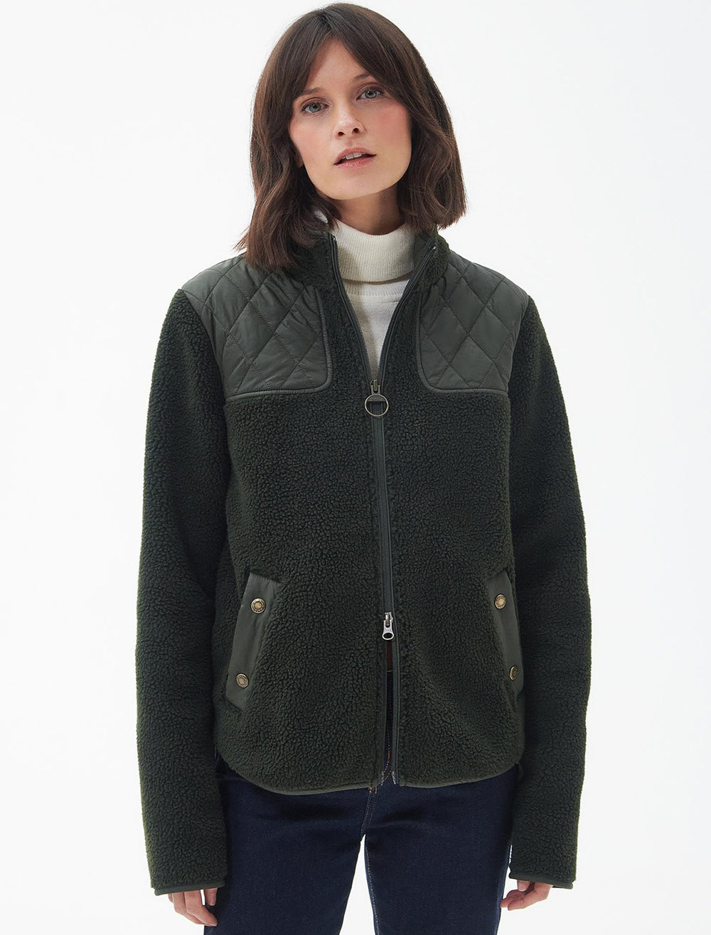 Model wearing Barbour's rockling fleece in olive.