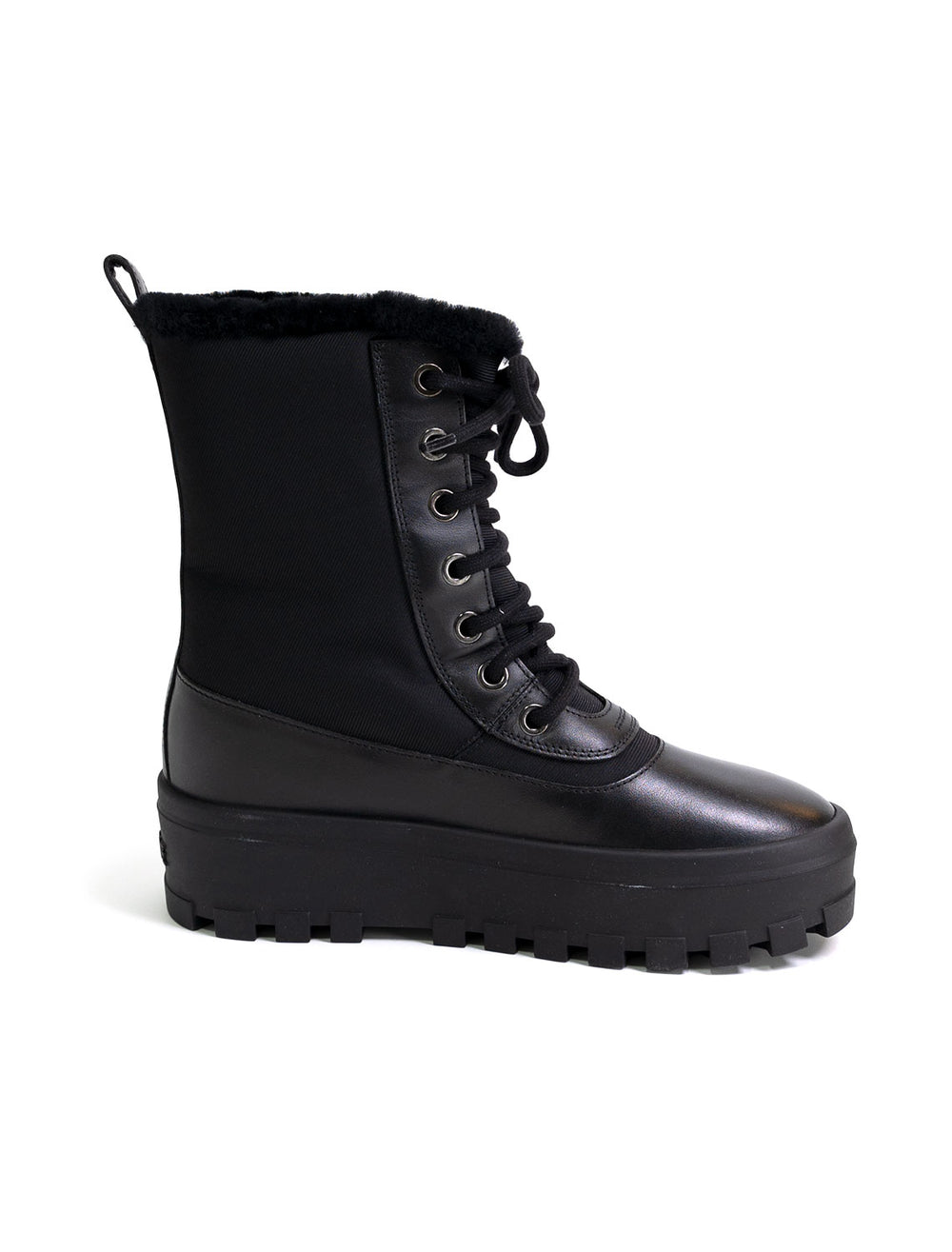 Side view of Mackage's hero boots in black.