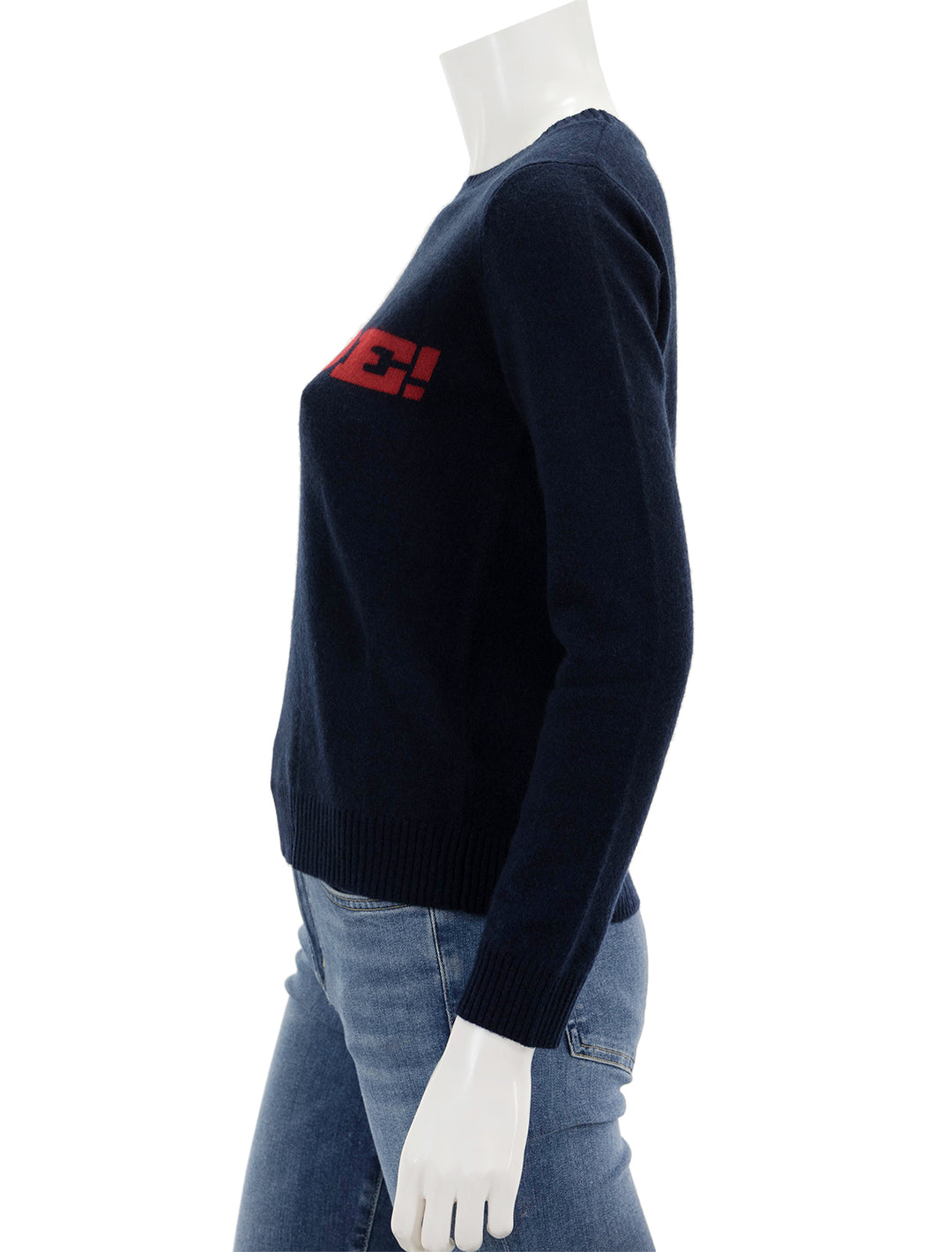 Side view of Jumper 1234's merde sweater in navy and red.