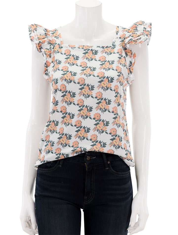 Front view of Nation LTD's cameo notched combo ruffle top in peach blossom.