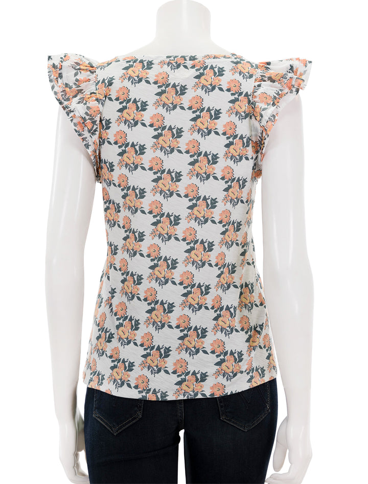 Back view of Nation LTD's cameo notched combo ruffle top in peach blossom.
