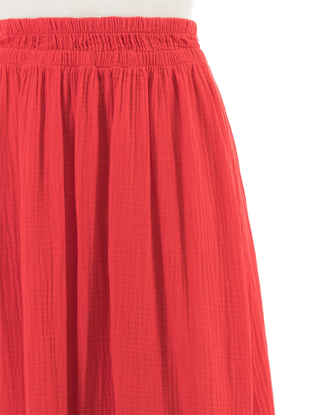 Close-up view of Nation LTD's safa skirt in cherry bomb.