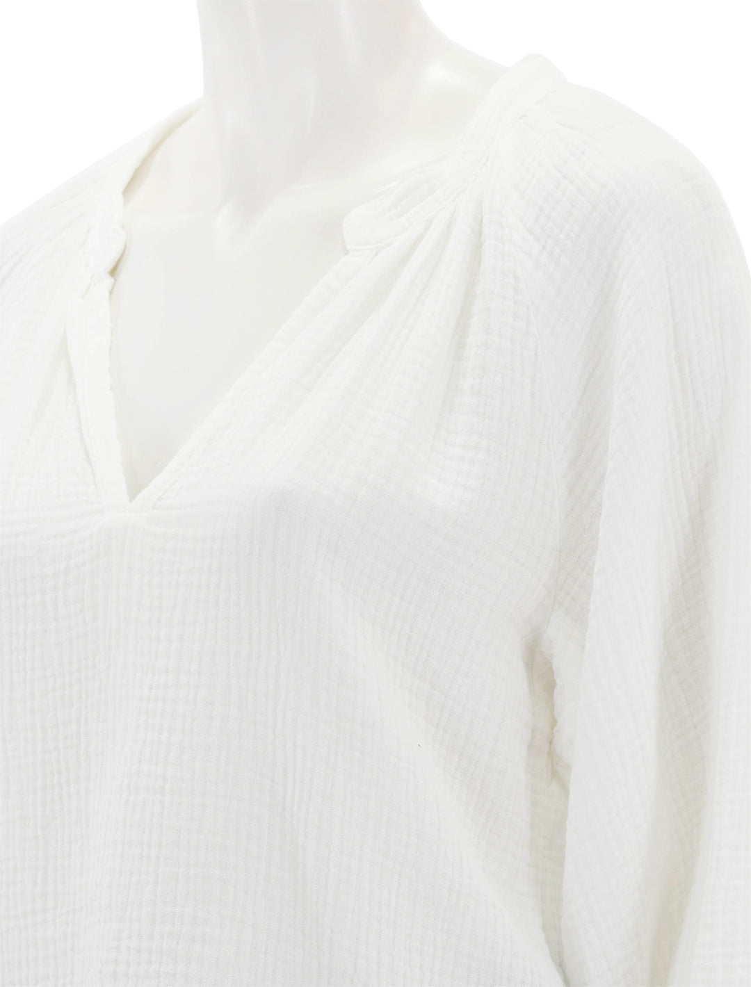 Close-up view of Nation LTD's mimi romance top in white.