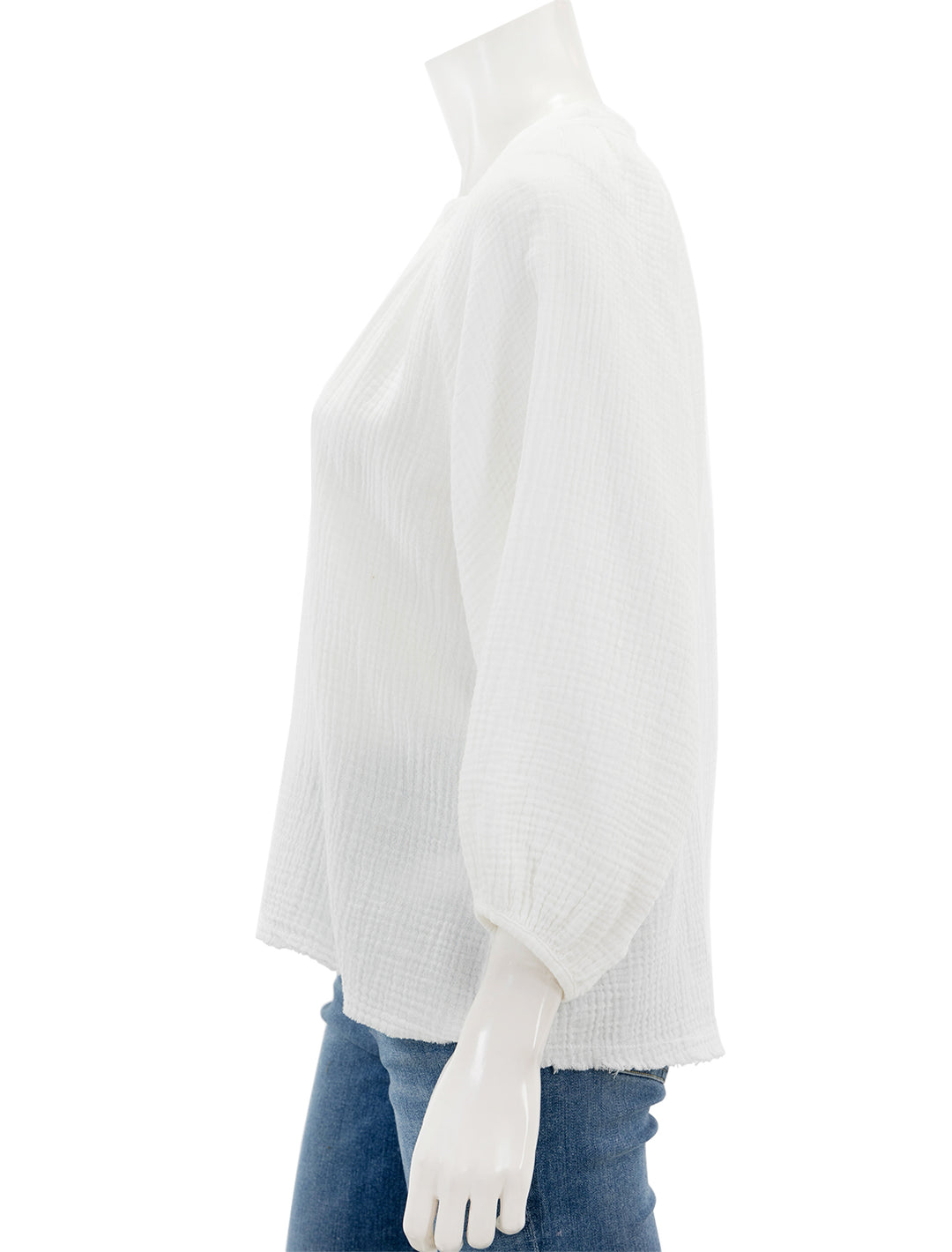 Side view of Nation LTD's mimi romance top in white.