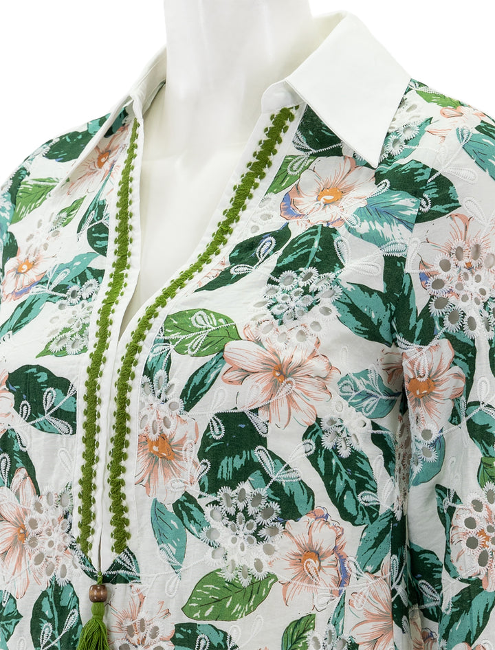 Close-up view of English Factory's floral tunic dress.