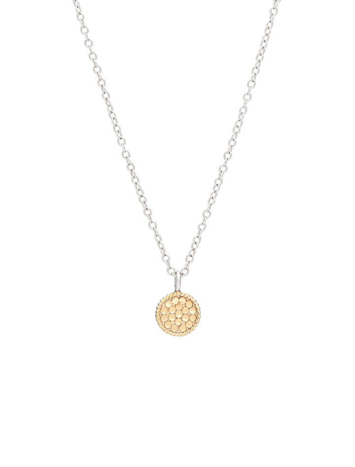 Front view of Anna Beck's classic small disc necklace in two-tone.