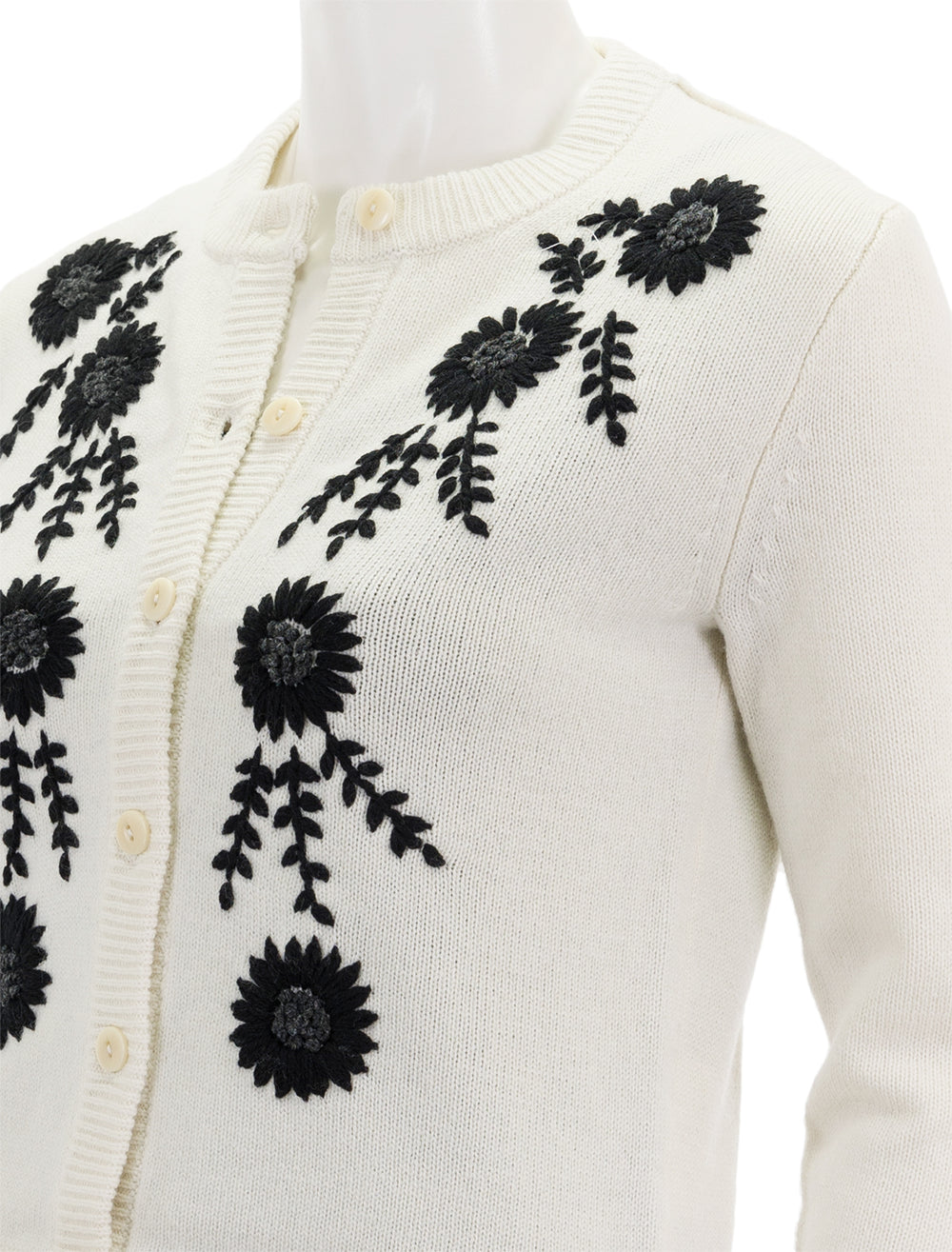 Close-up view of Alex Mills' becca embroidered cardigan in ivory combo.