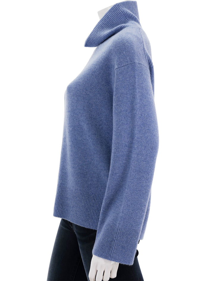 Side view of Alex Mill's cecile turtleneck sweater in cashmere heather blue.
