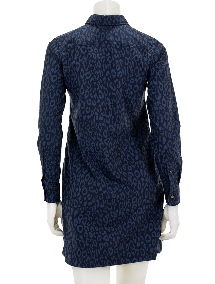 Back view of Ann Mashburn's long sleeve popover dress in blue and navy leopard.