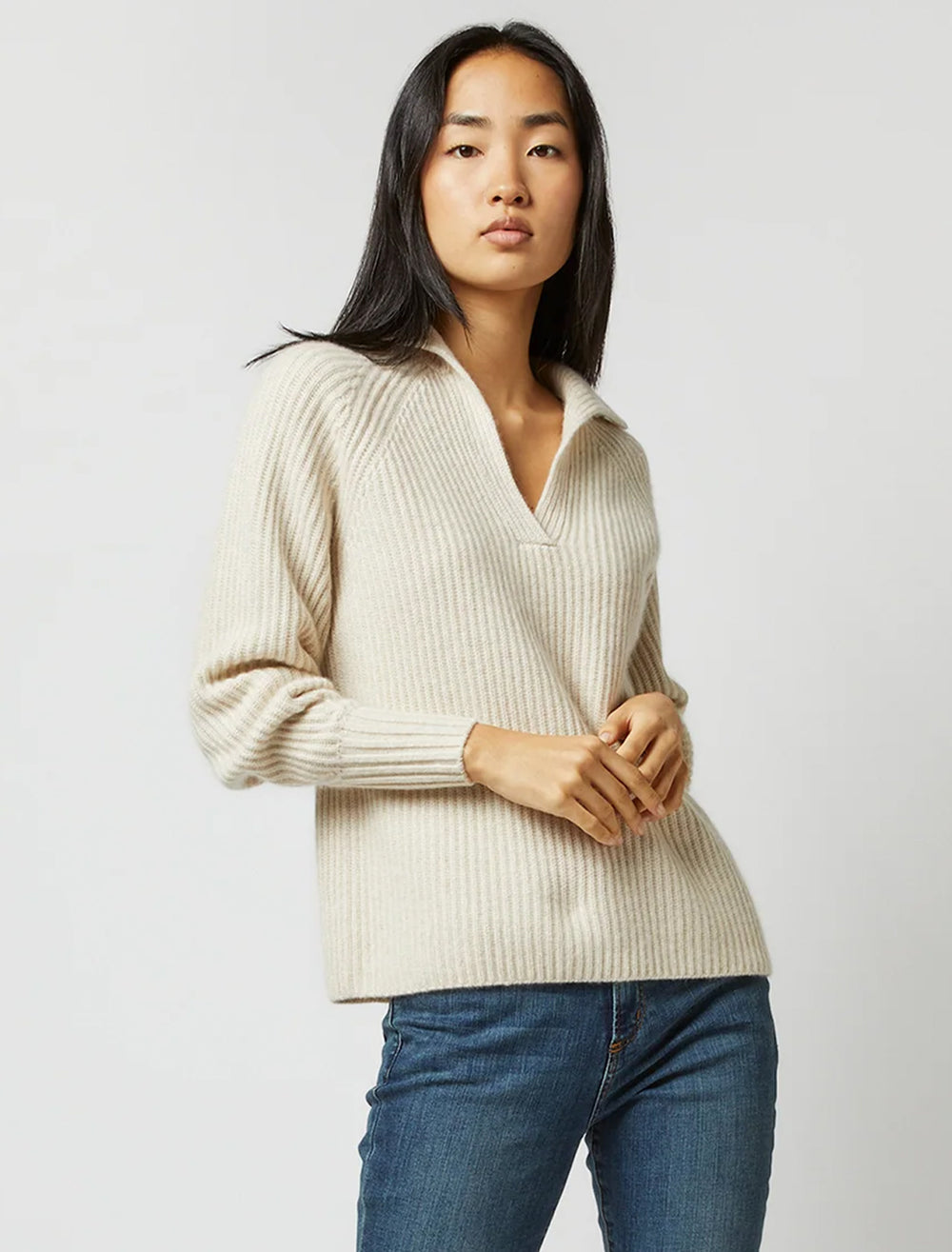 Model wearing Ann Mashburn's blair johnny collar sweater in heather wheat.