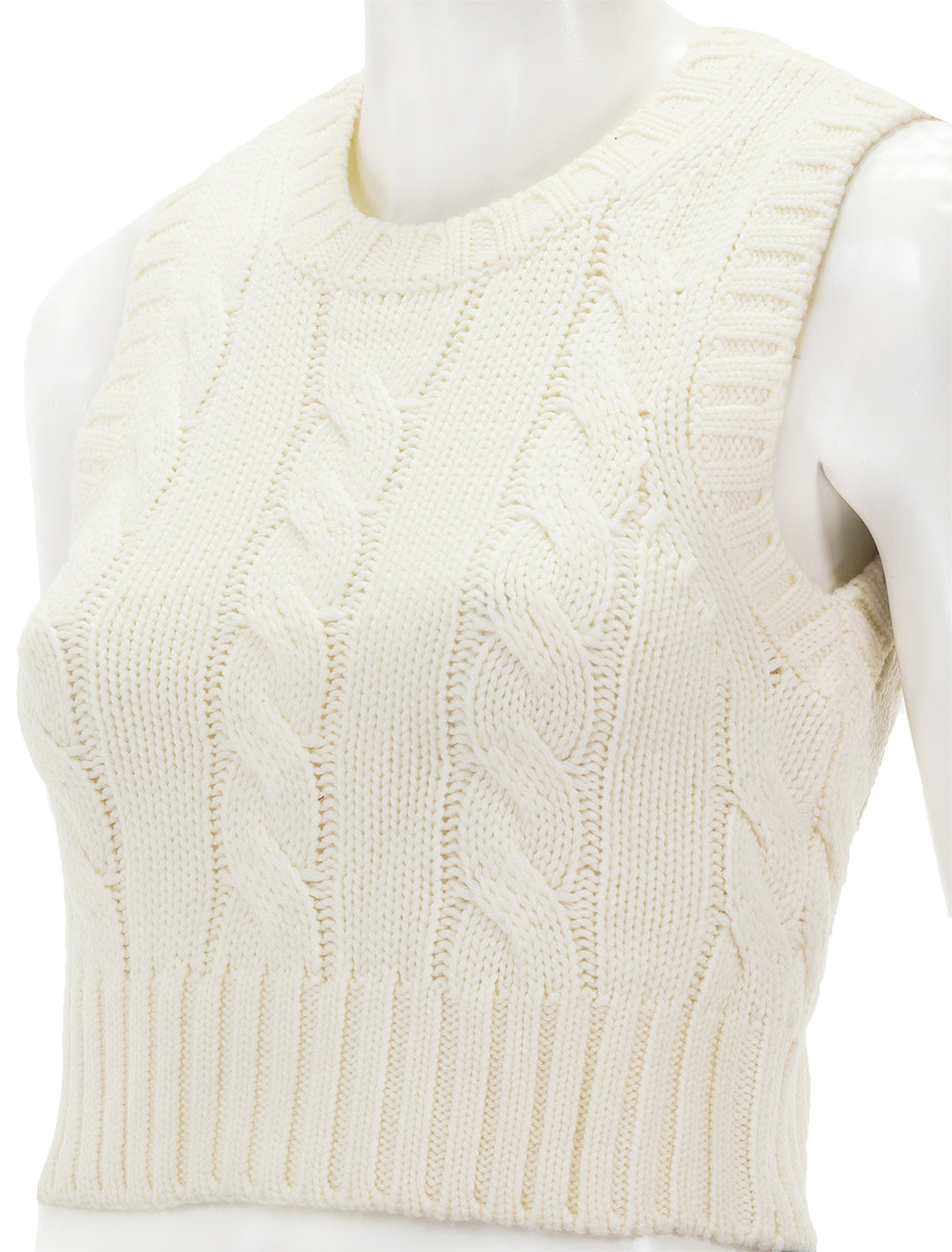 Close-up view of STAUD's pingo sweater vest in ivory.