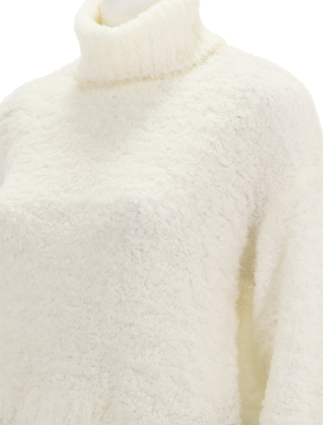 Close-up view of STAUD's ezio sweater in white.