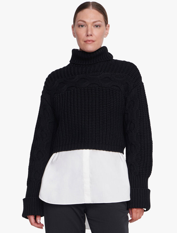 Model wearing STAUD's vernacular sweater in black.