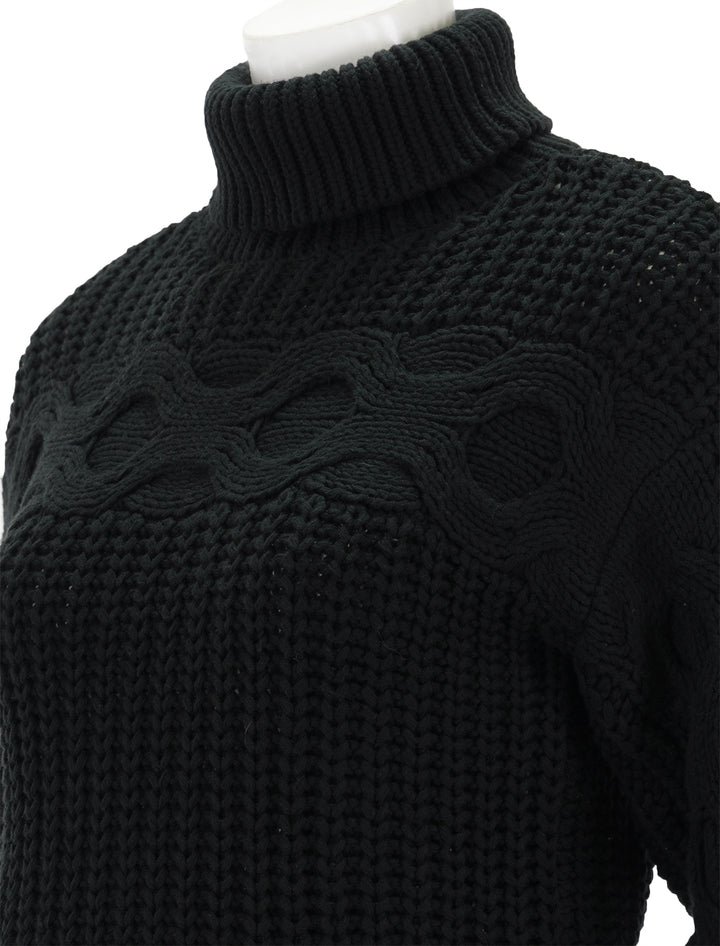 Close-up view of STAUD's vernacular sweater in black.