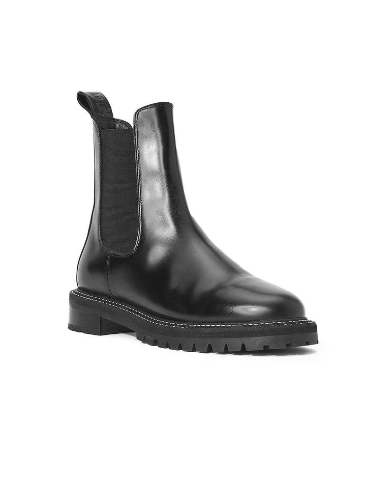 Front view of Staud's dutch boot in black.