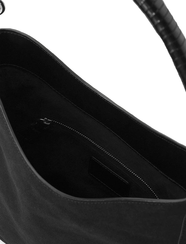 Close-up inside view of STAUD's mel bag in black.