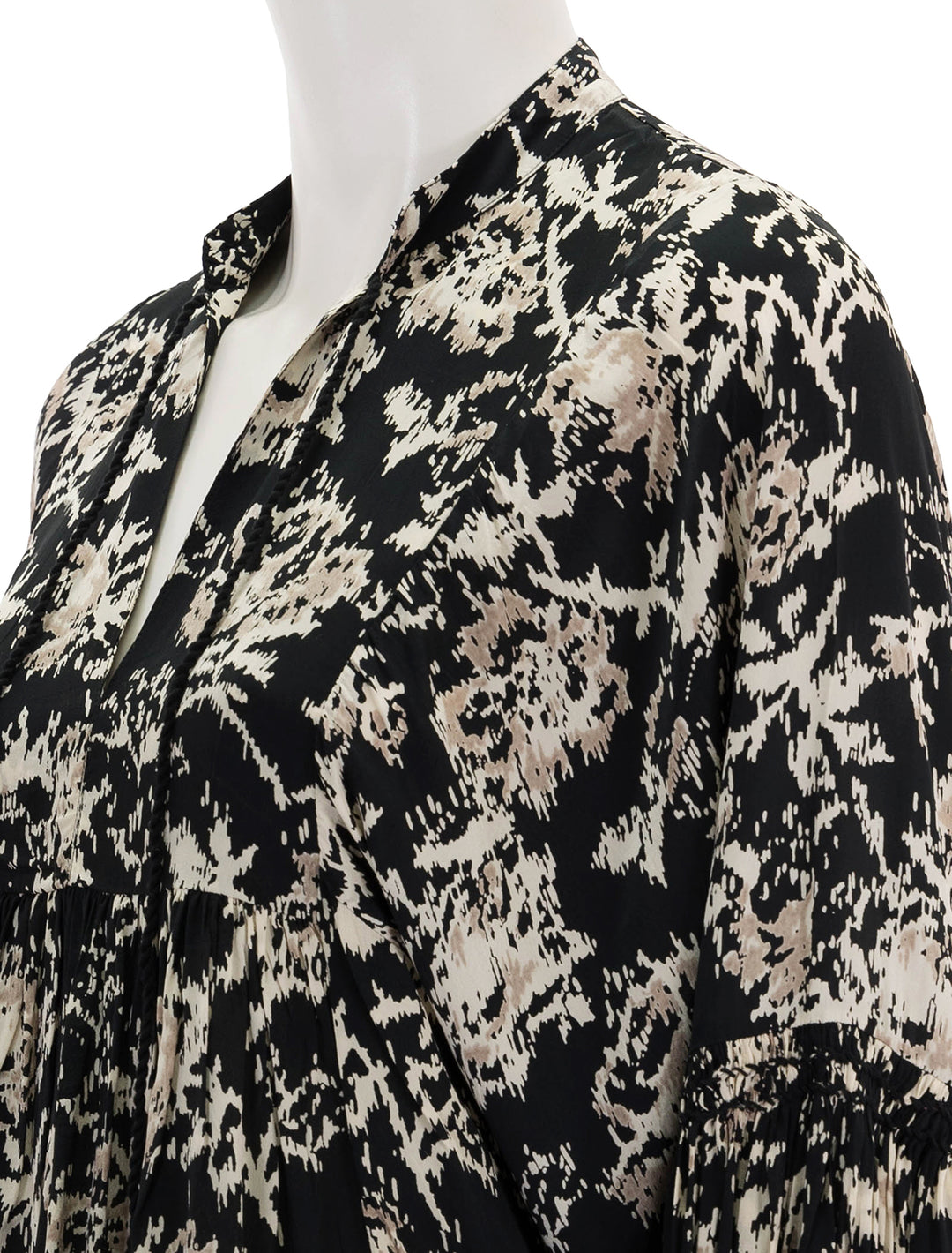 close up view of baltik blouse in noir print