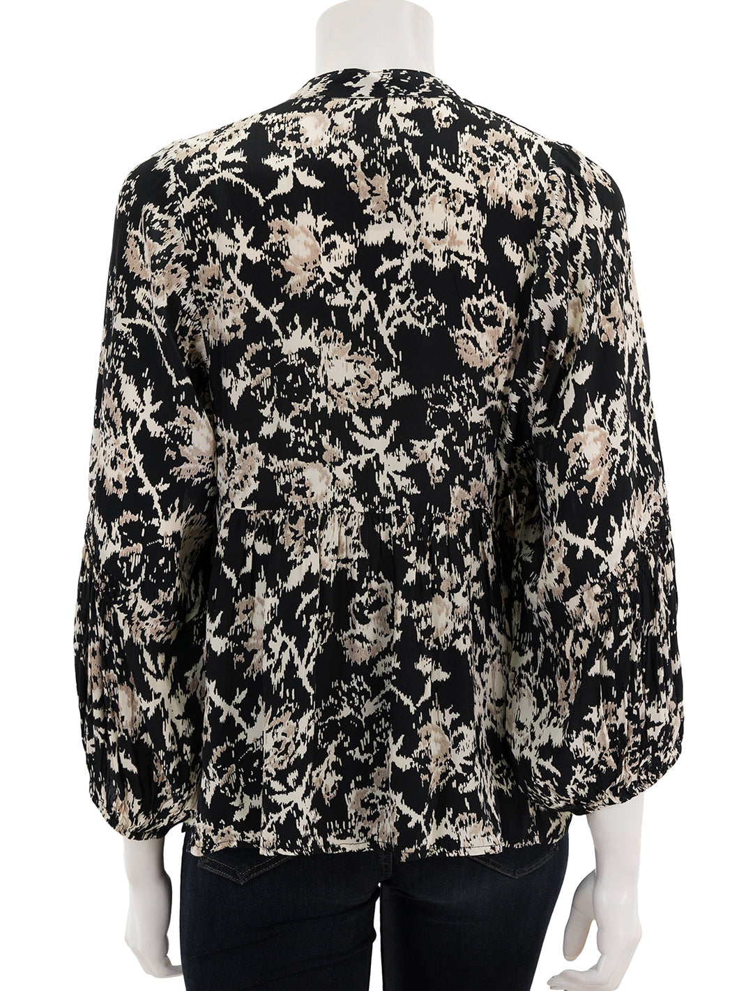back view of baltik blouse in noir print