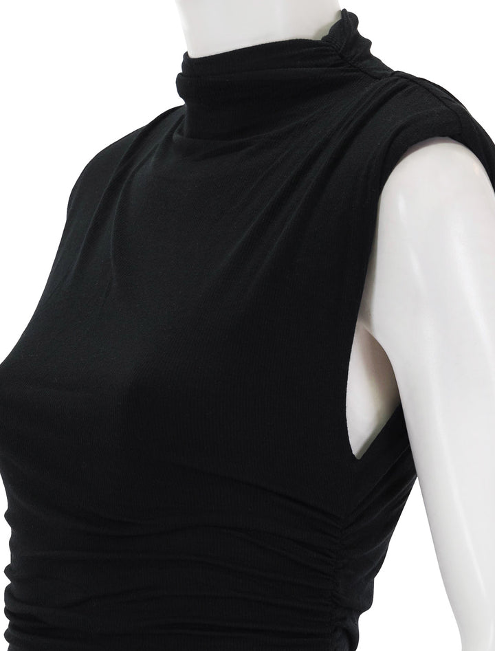 Close-up view of Veronica Beard's brasha dress in black.