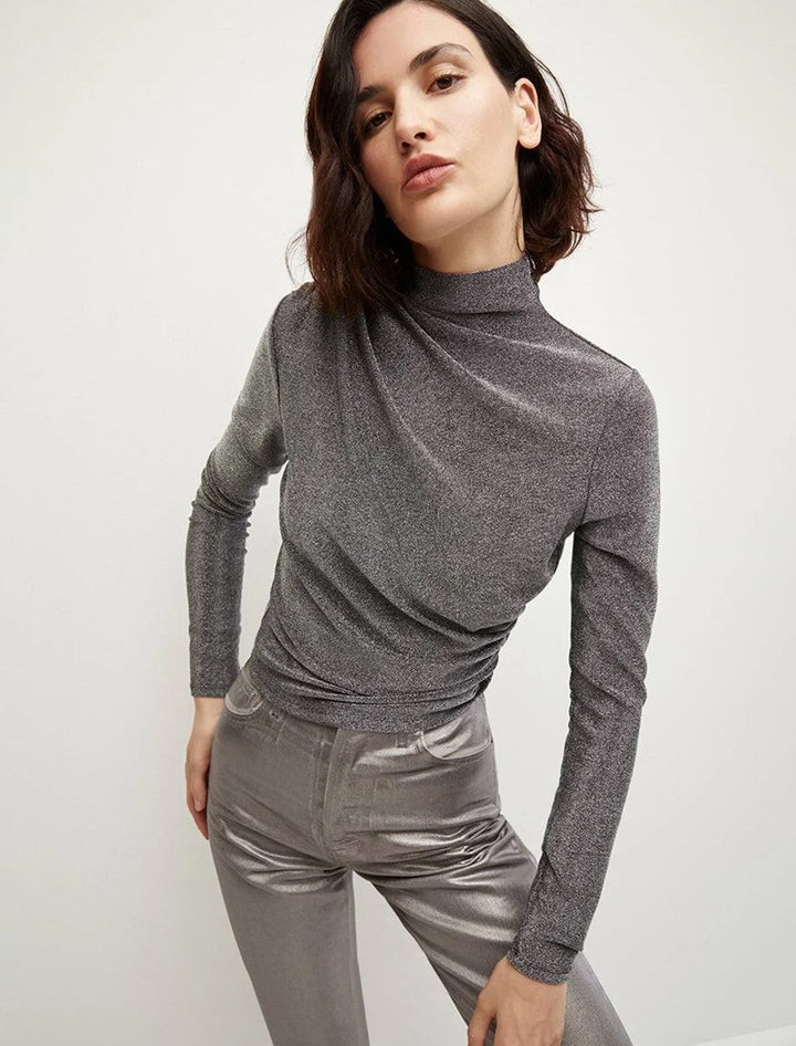 Model wearing Veronica Beard's mylie top in gunmetal.