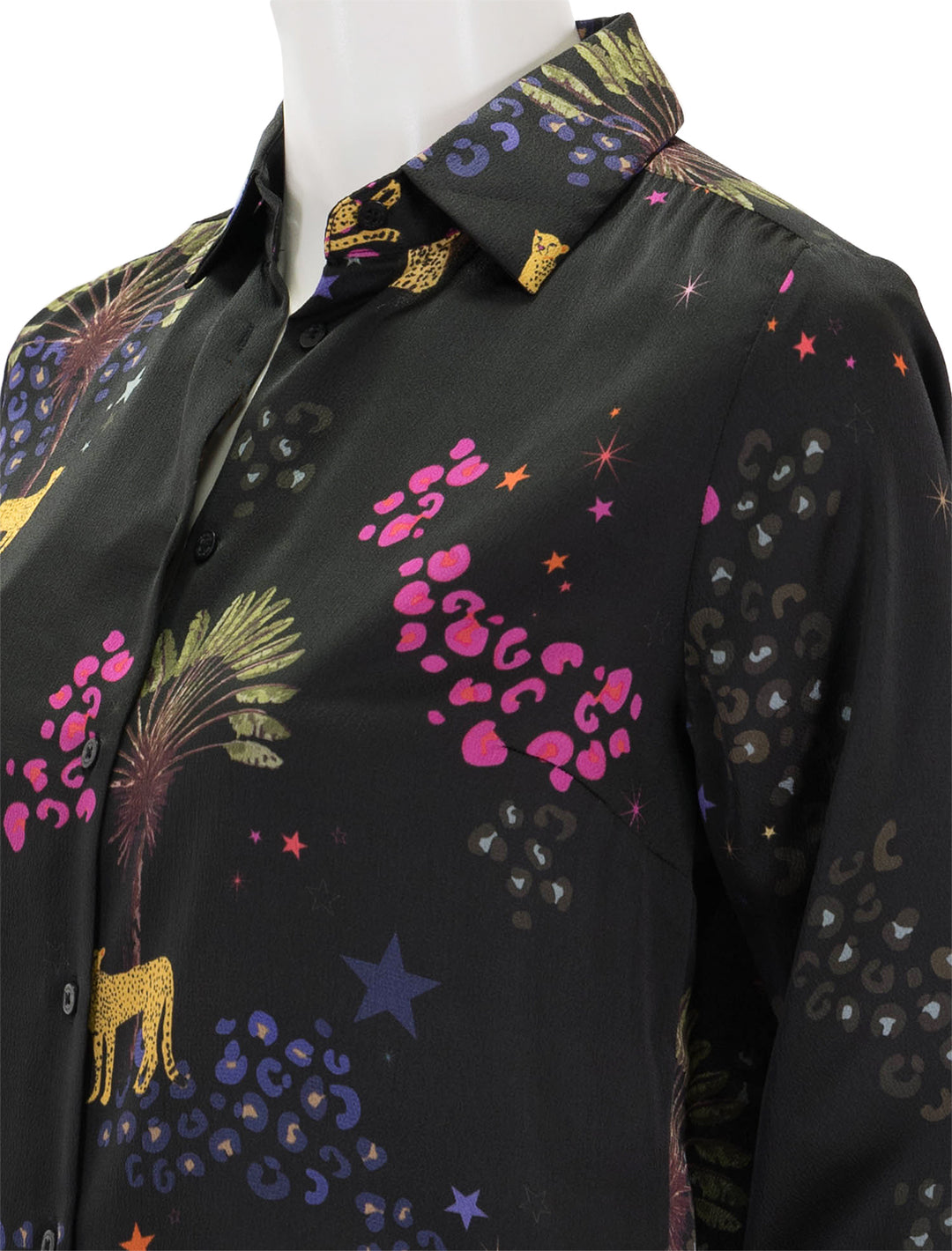 Close-up view of Vilagallo's camisa isabella black cheetah blouse.