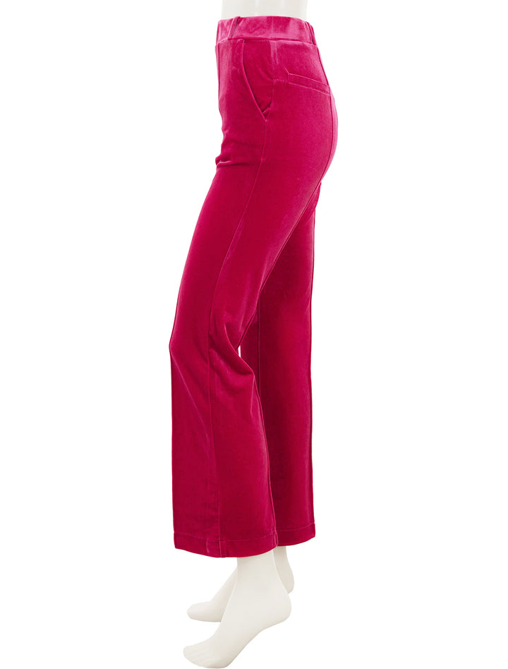 Side view of Vilagallo's carla pink velvet pants.
