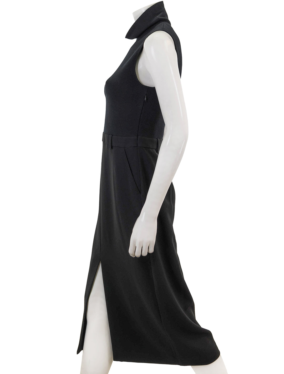 Side view of Theory's funnel neck dress in black.