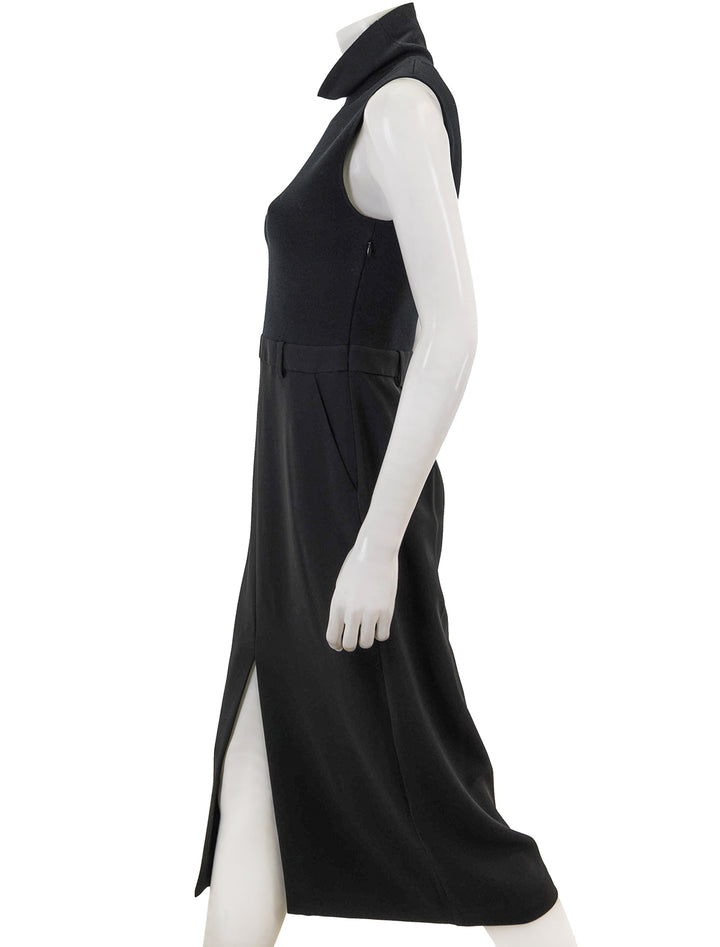 Side view of Theory's funnel neck dress in black.