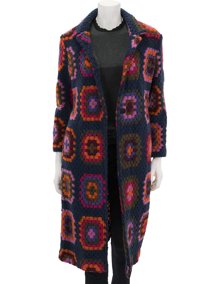 Front view of Vilagallo's yana crochet cardigan coat, unbuttoned.