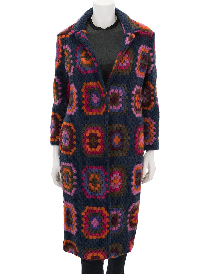 Front view of Vilagallo's yana crochet cardigan coat, buttoned.