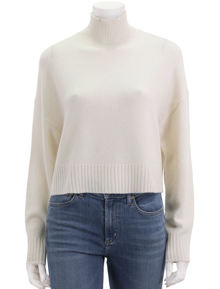Front view of Theory's cropped tneck cashmere sweater.
