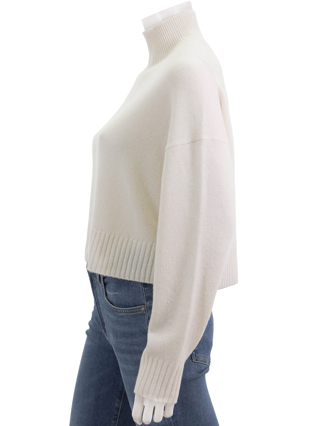 Side view of Theory's cropped tneck cashmere sweater.