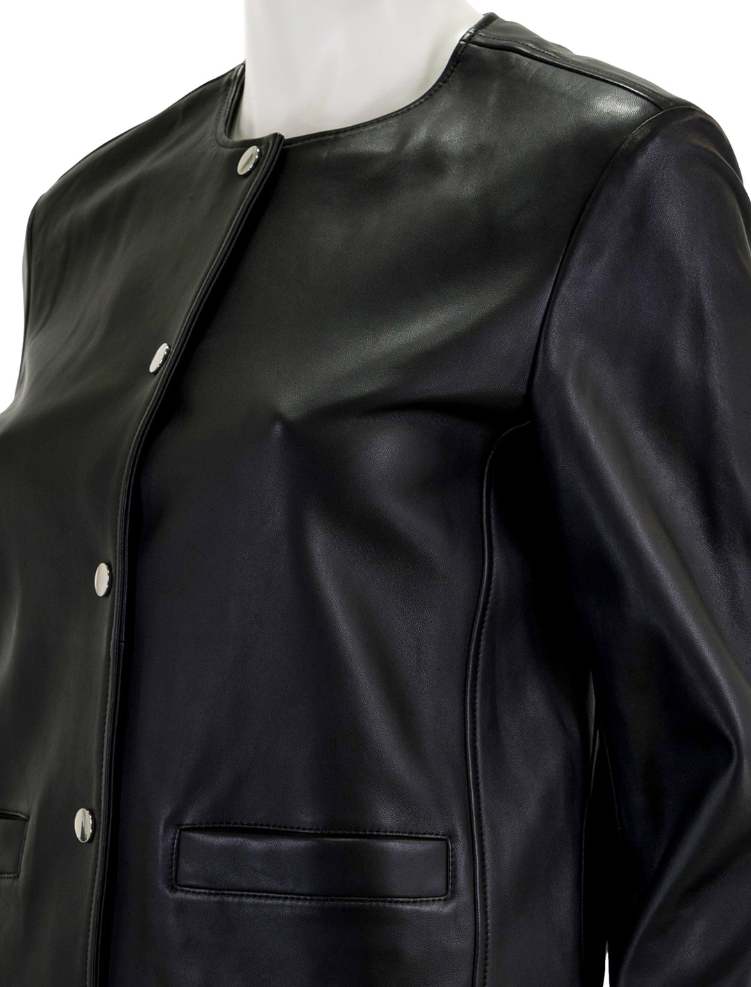 Close-up view of Theory's crop leather jacket.