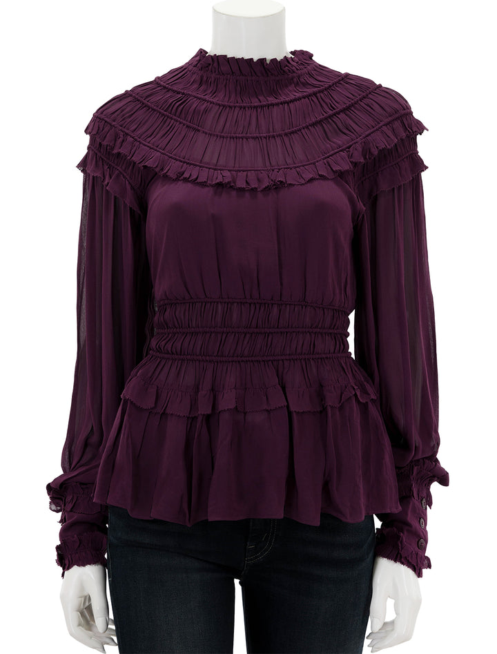 Front view of Farm Rio's burgundy ruffled blouse.
