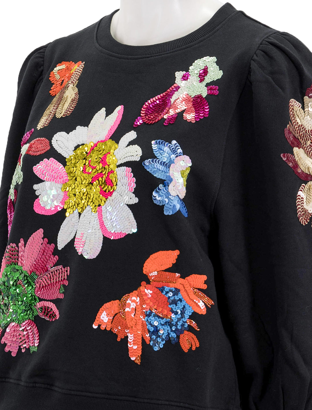 Close-up view of Essentiel Antwerp's enna sweatshirt with sequins in black.
