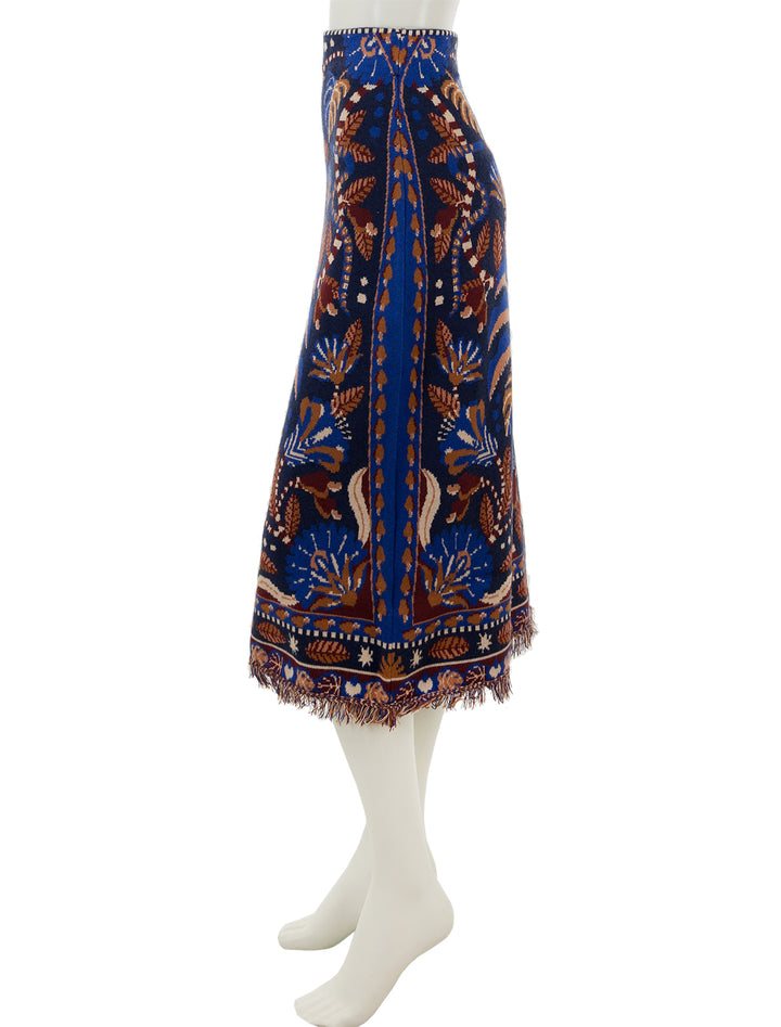Side view of Farm Rio's nature beauty blue scarf knit midi skirt.