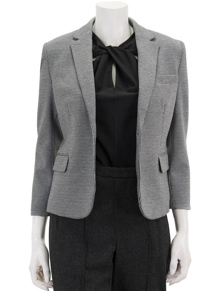 Front view of Theory's shrunken knit blazer in black & white multi, unbuttoned.
