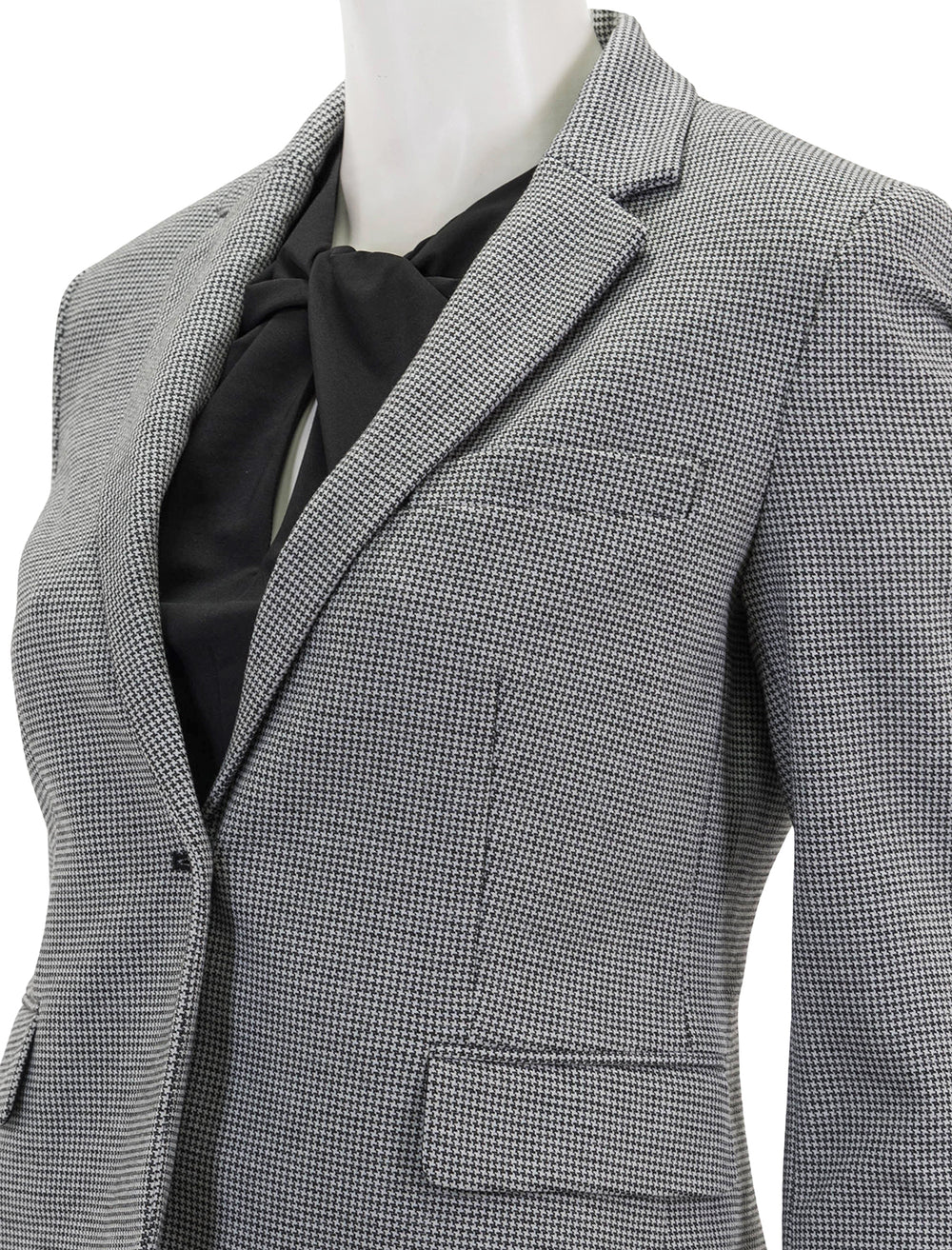 Close-up view of Theory's shrunken knit blazer in black & white multi.