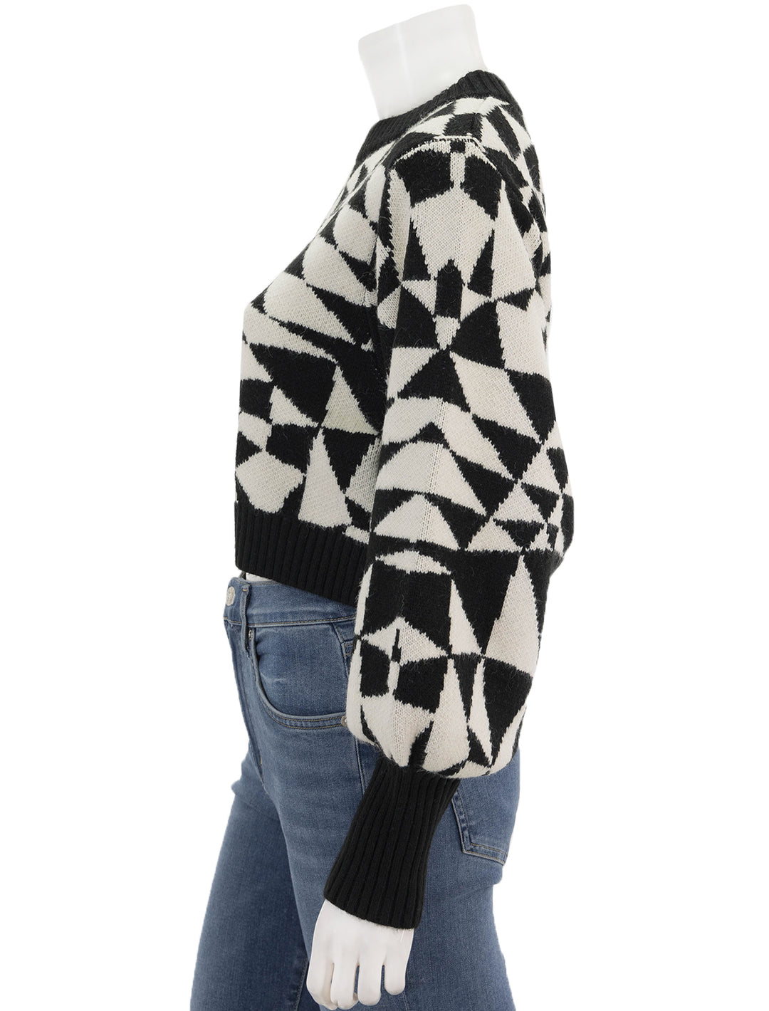 Side view of FARM Rio's heart deco black knit sweater.