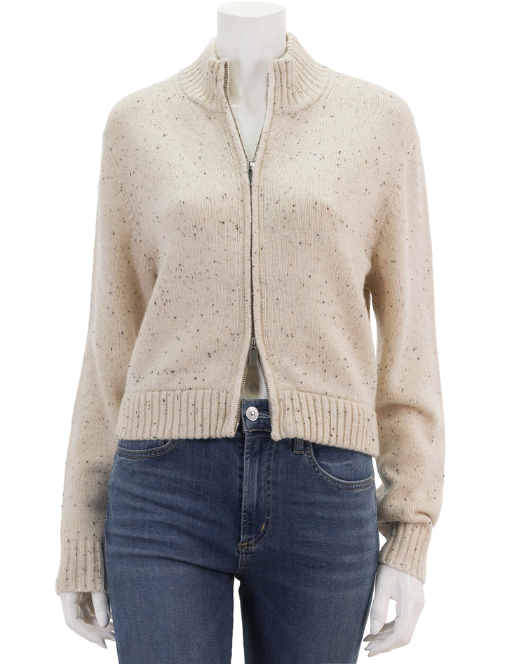 Front view of Theory's mock zip cardigan in cream.
