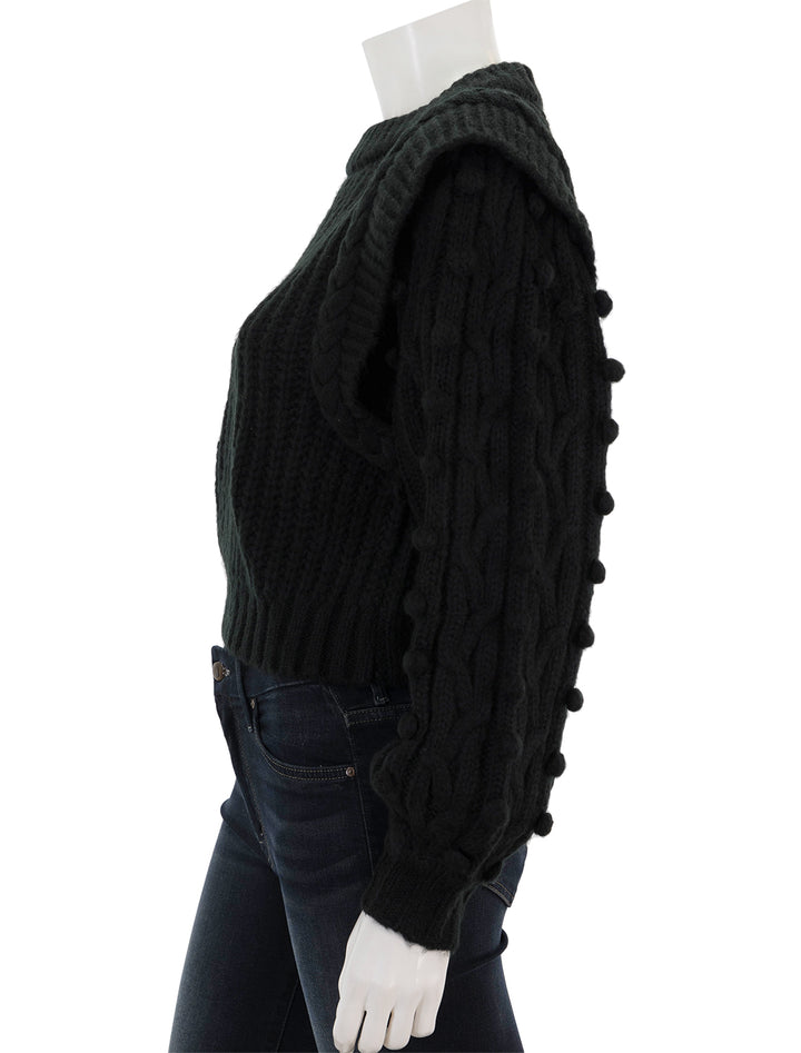 Side view of FARM Rio's black braided sweater.