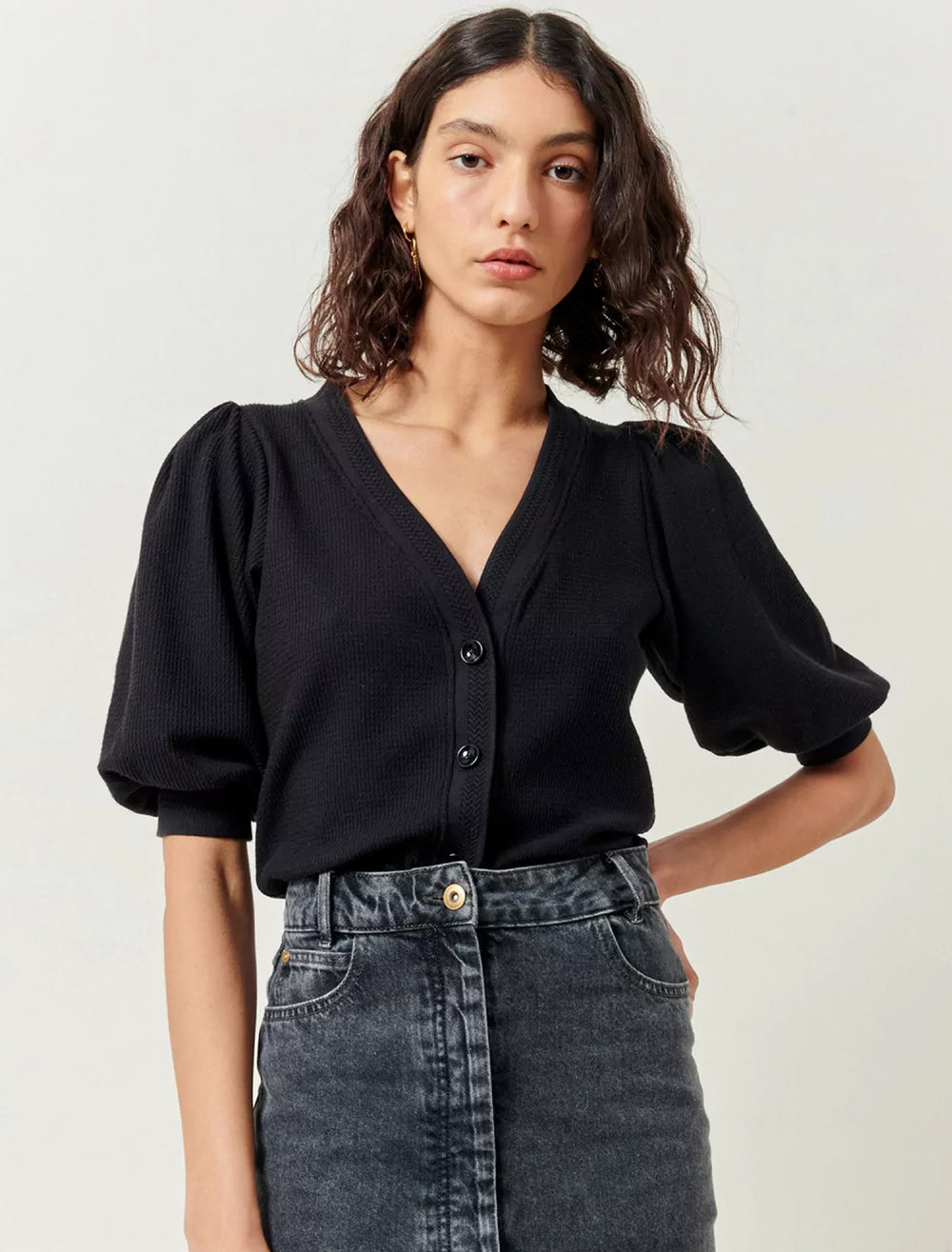 Model wearing Sessun's carbonel top in phantom.