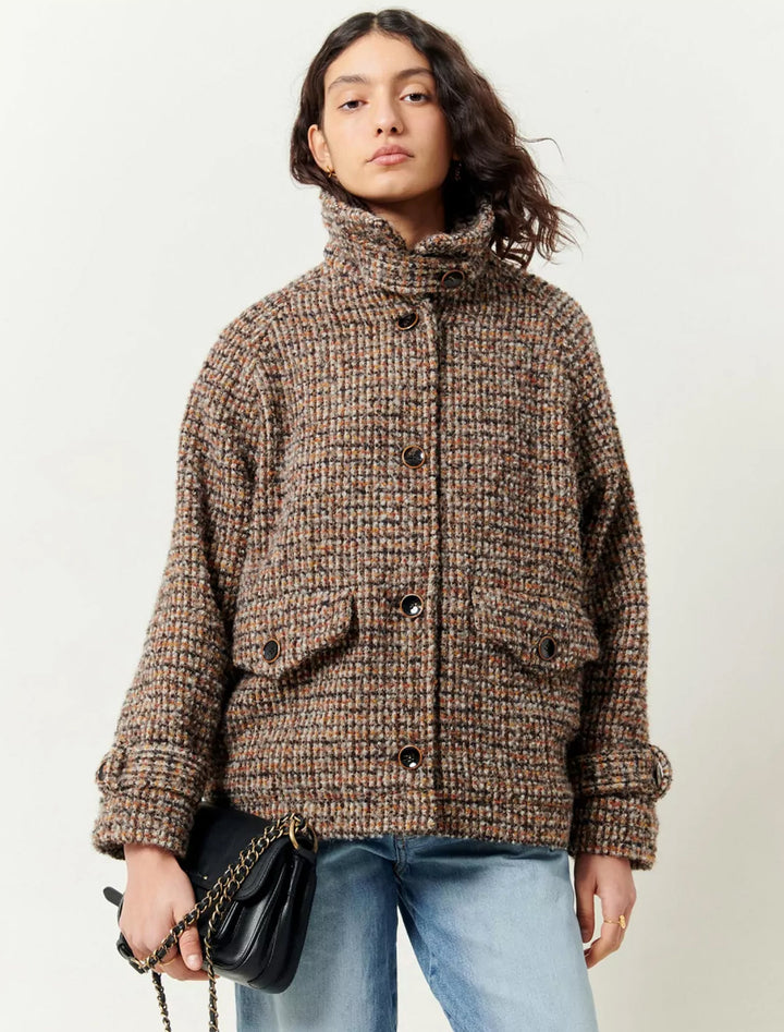 Model wearing Sessun's lee valley jacket in covent tweed.