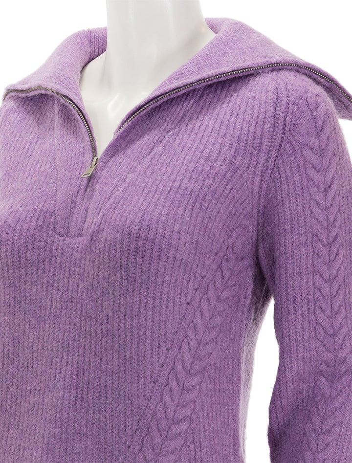 Close-up view of Suncoo Paris' poldera pullover in mauve.