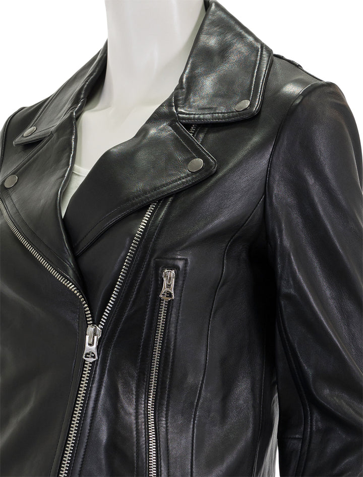 Close-up view of Rag & Bone's mack jacket in black.