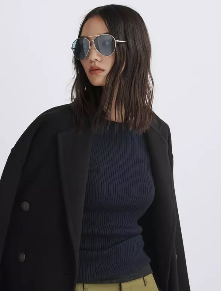 Model wearing Rag & Bone's audrina crew in navy.