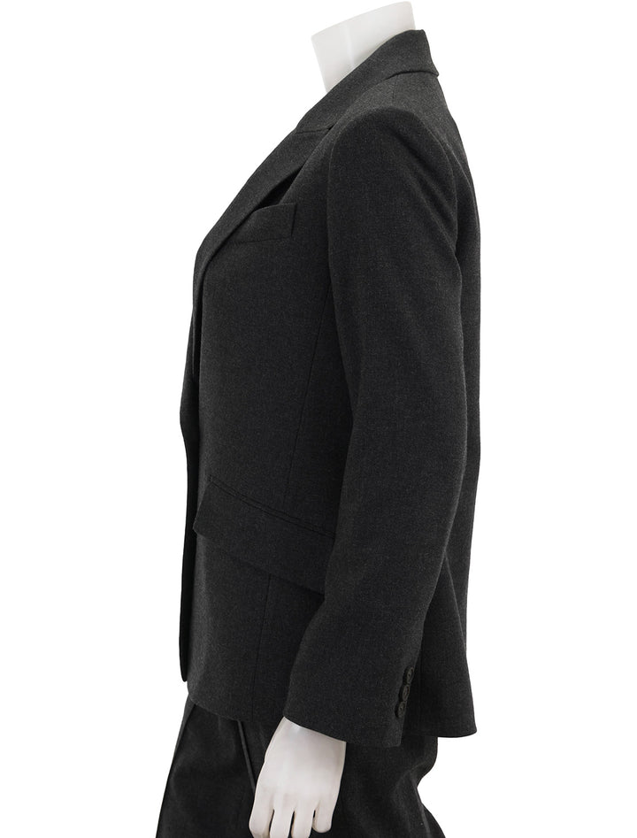 Side view of Vince's charcoal single breasted blazer.