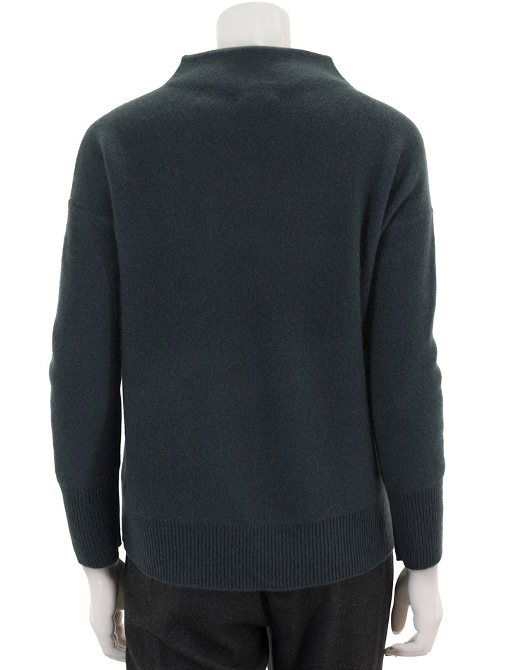 Back view of Vince's funnel neck sweater in azurine.