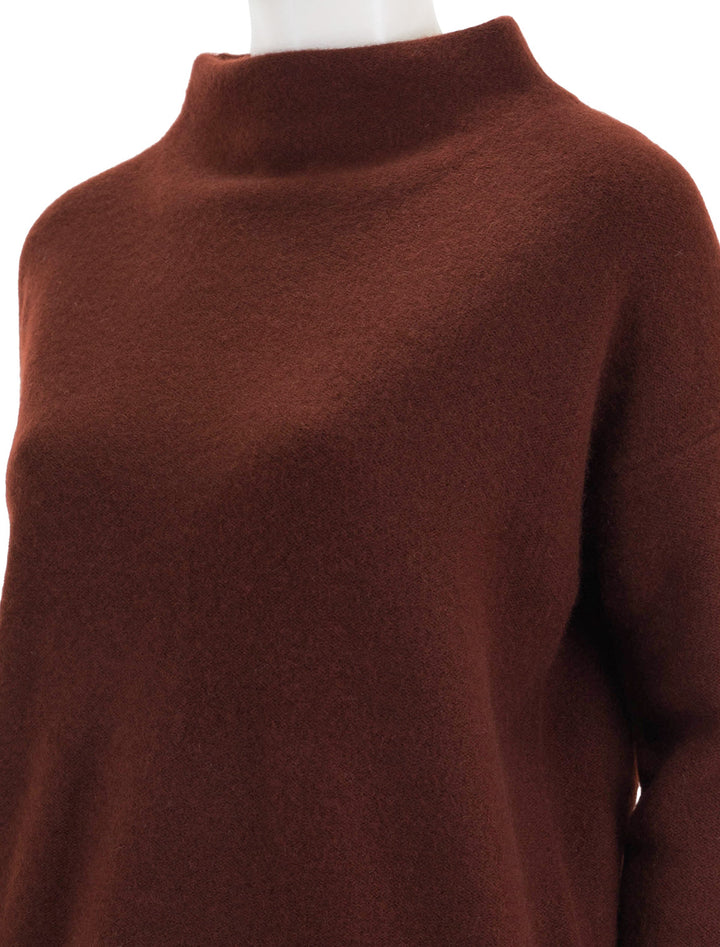 Close-up view of Vince's funnel neck pullover in cinnamon stick.