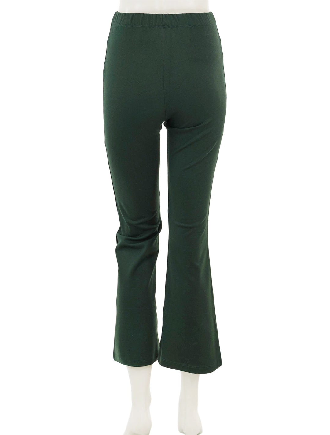 Back view of Clare V.'s le flare ponte pant in forest.